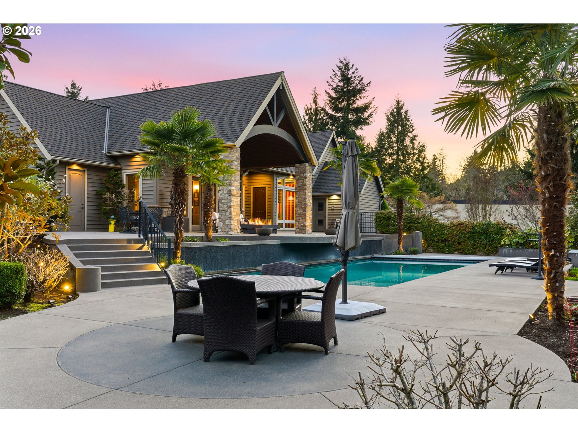 951 Atwater Road Lake Oswego, OR 97034 - Photo 3 of 46 a view of a house with backyard and sitting area