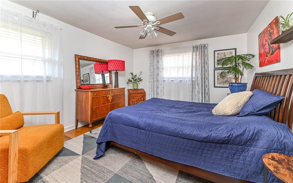 160 Siebert Road Pittsburgh, PA 15237 - Photo 14 of 31 a bedroom with a bed and a couch