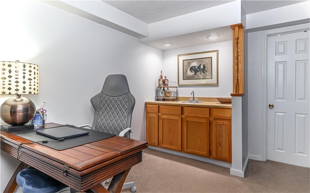 160 Siebert Road Pittsburgh, PA 15237 - Photo 20 of 31 a living room with furniture and a wooden floor