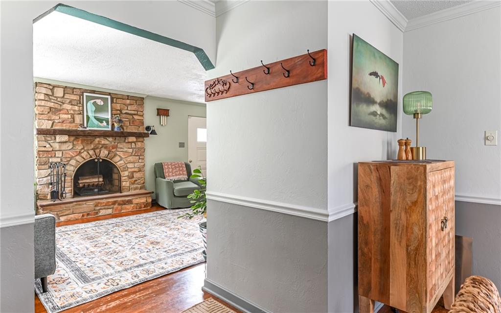 160 Siebert Road Pittsburgh, PA 15237 - Photo 5 of 31 a view of living room with furniture and a fireplace