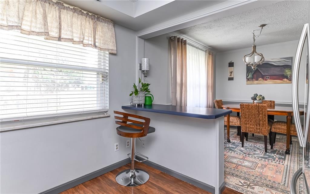 160 Siebert Road Pittsburgh, PA 15237 - Photo 10 of 31 a living room with furniture and a window