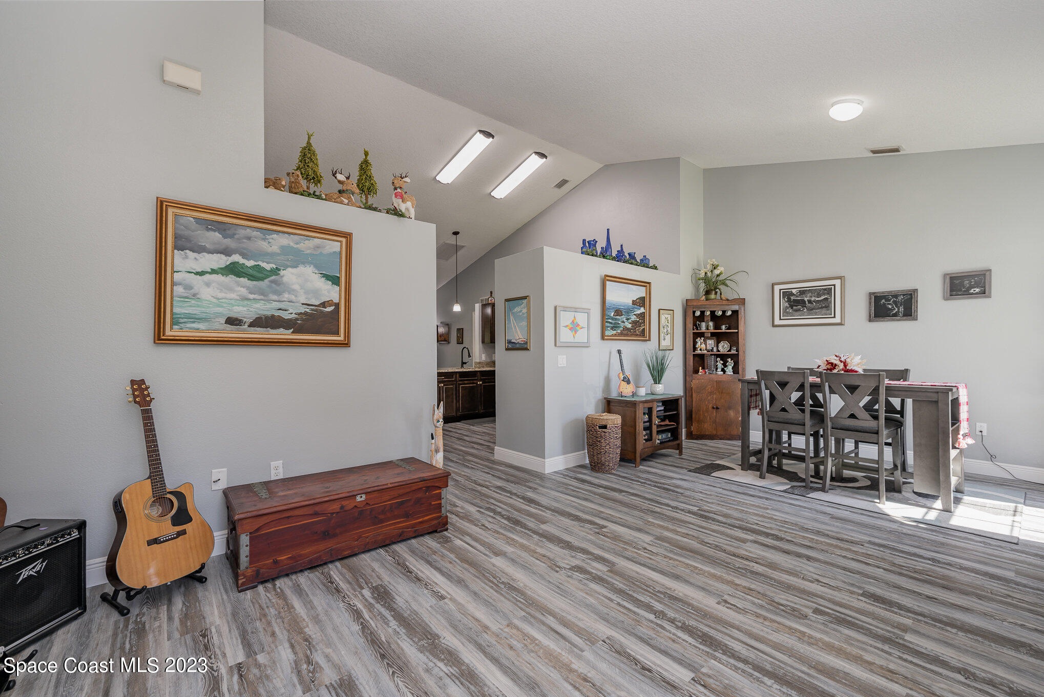 1780 Atz Road Malabar, FL 32950 - Photo 6 of 34 a living room with furniture and wooden floor
