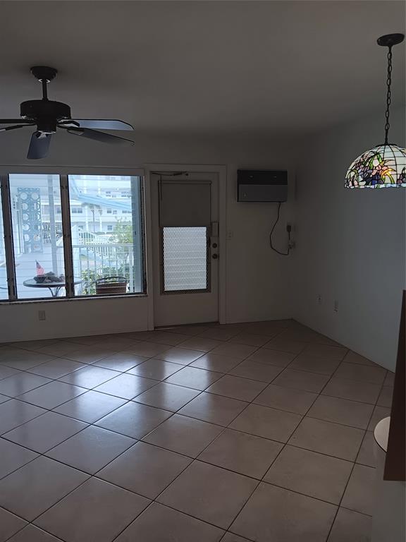 1110 North Riverside Drive, Unit 26 Pompano Beach, FL 33062 - Photo 13 of 17 a view of an empty room and window