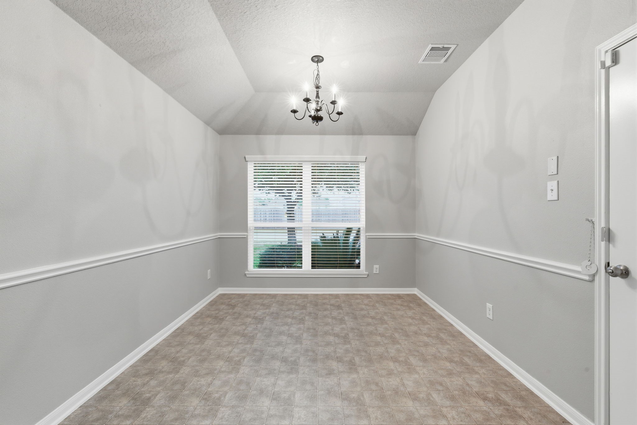 4910 Conifer Ridge Way Humble, TX 77346 - Photo 19 of 48 a view of an empty room with a window