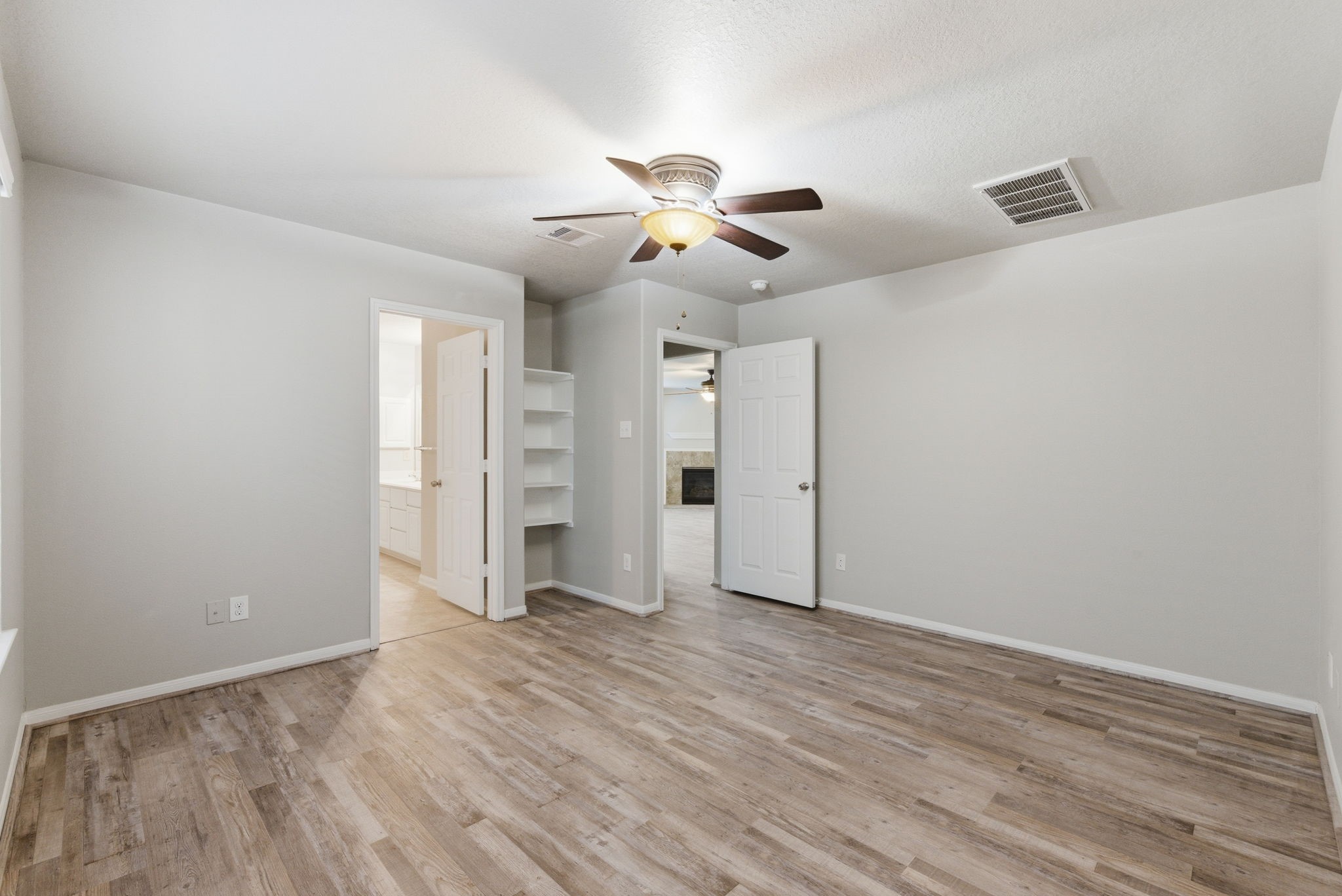 4910 Conifer Ridge Way Humble, TX 77346 - Photo 23 of 48 wooden floor in an empty room