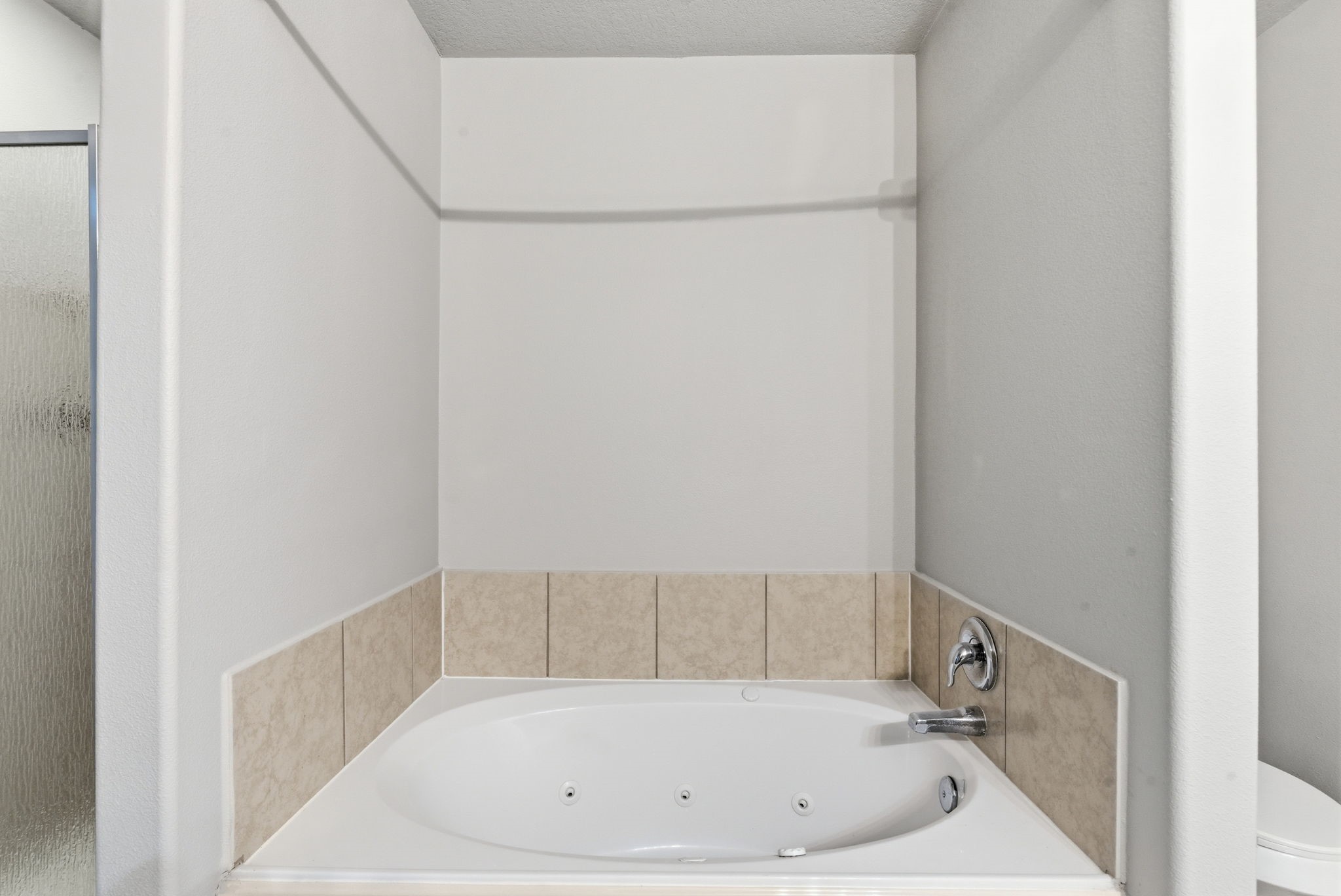 4910 Conifer Ridge Way Humble, TX 77346 - Photo 26 of 48 a bathroom with a bathtub