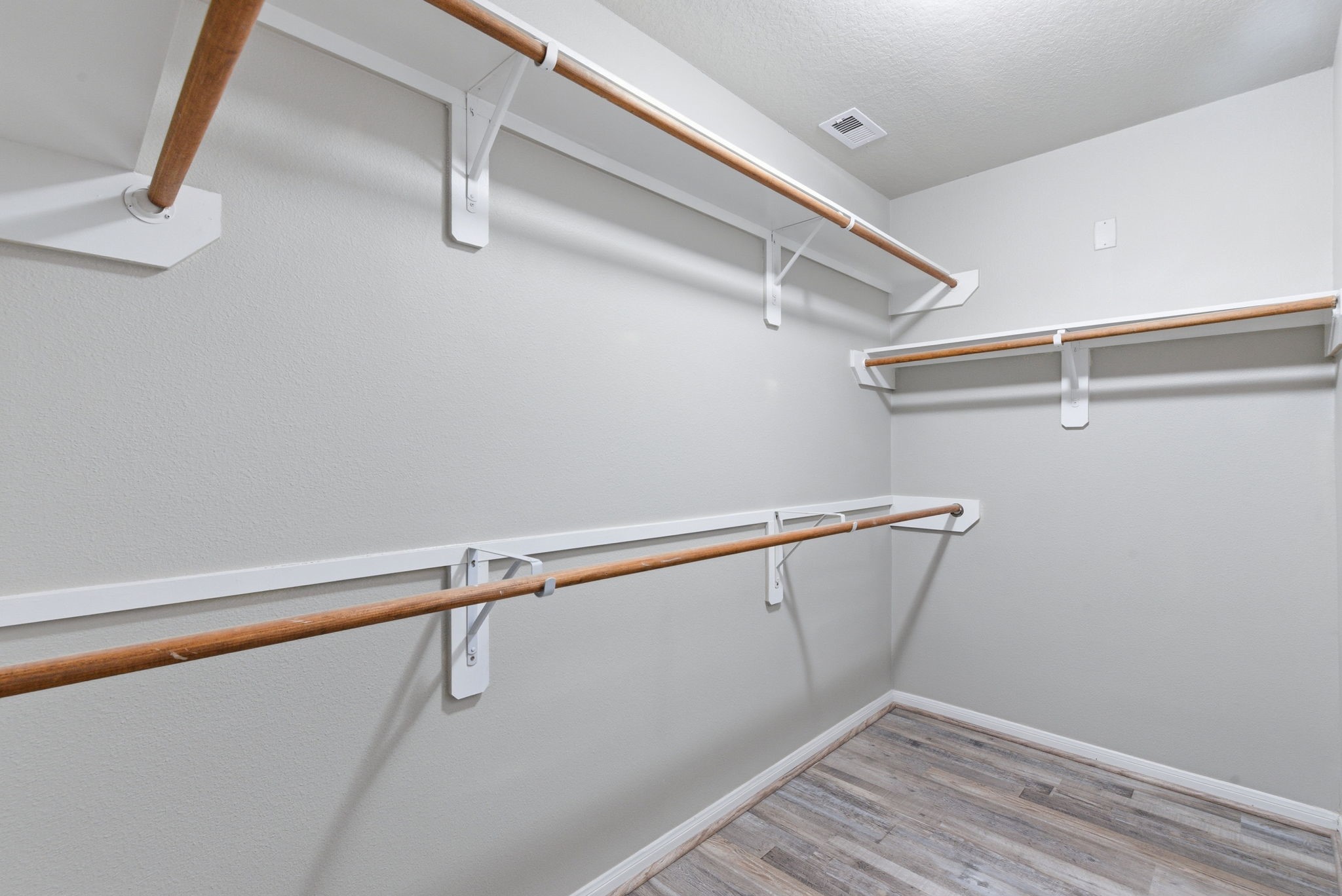 4910 Conifer Ridge Way Humble, TX 77346 - Photo 27 of 48 a view of a room with racks on the wall