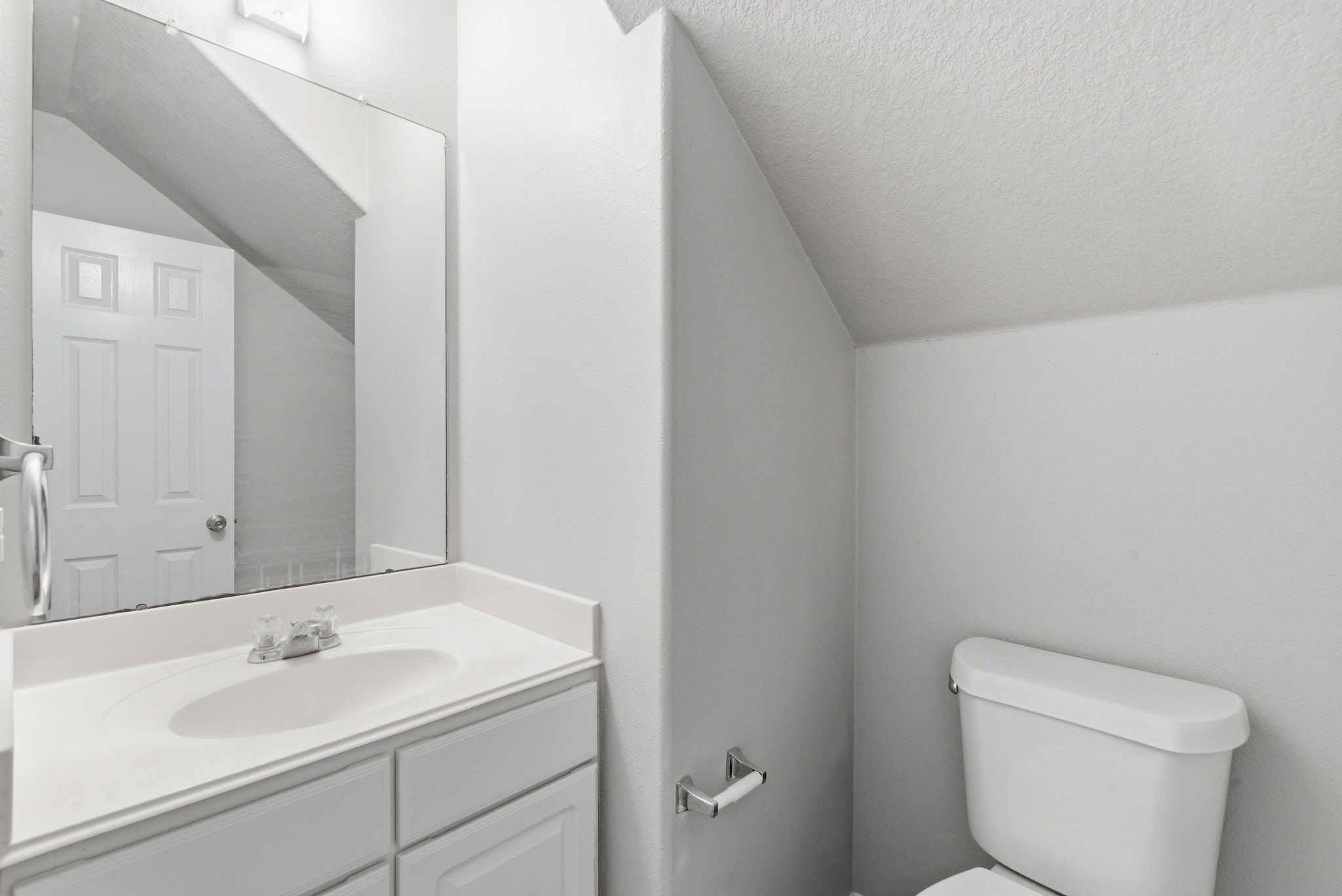 4910 Conifer Ridge Way Humble, TX 77346 - Photo 28 of 48 a bathroom with a sink and a toilet