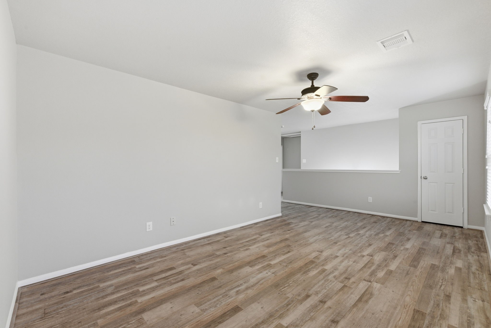 4910 Conifer Ridge Way Humble, TX 77346 - Photo 33 of 48 a view of an empty room with a window