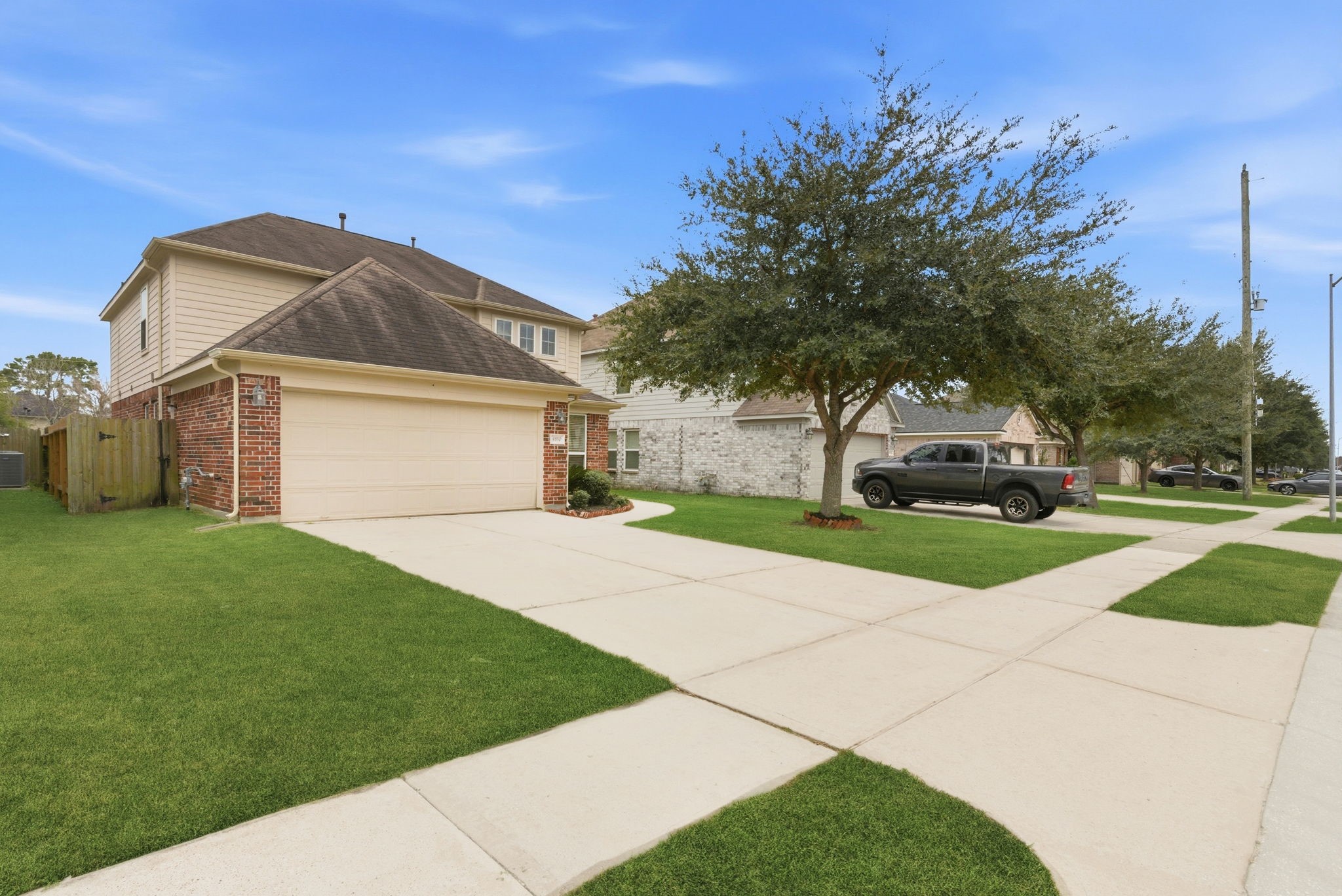4910 Conifer Ridge Way Humble, TX 77346 - Photo 4 of 48 a front view of a house with a garden