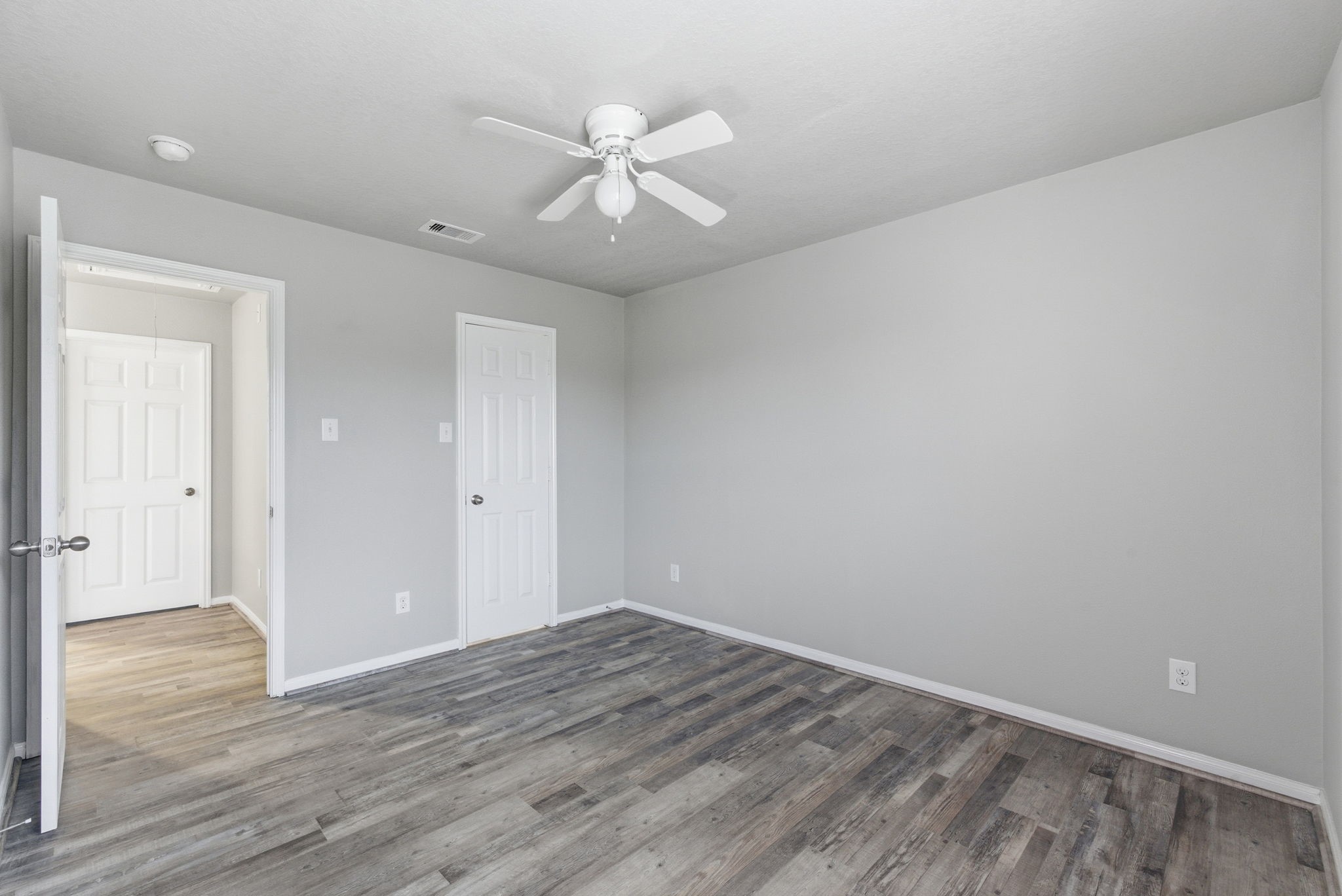 4910 Conifer Ridge Way Humble, TX 77346 - Photo 42 of 48 wooden floor in an empty room