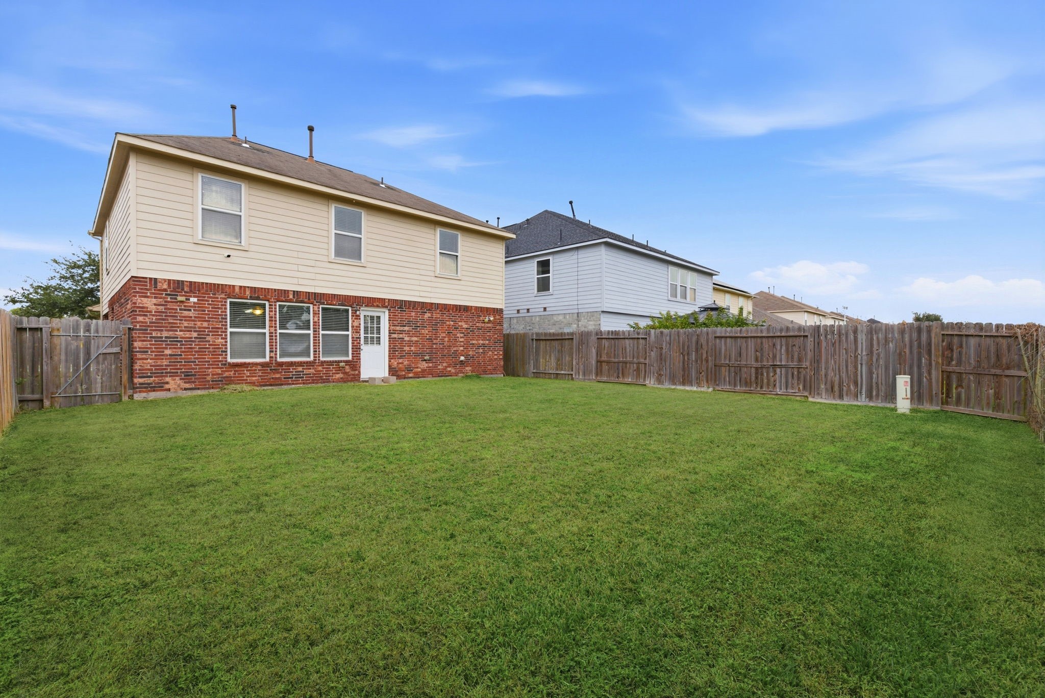4910 Conifer Ridge Way Humble, TX 77346 - Photo 43 of 48 a view of a house with a yard and sitting area