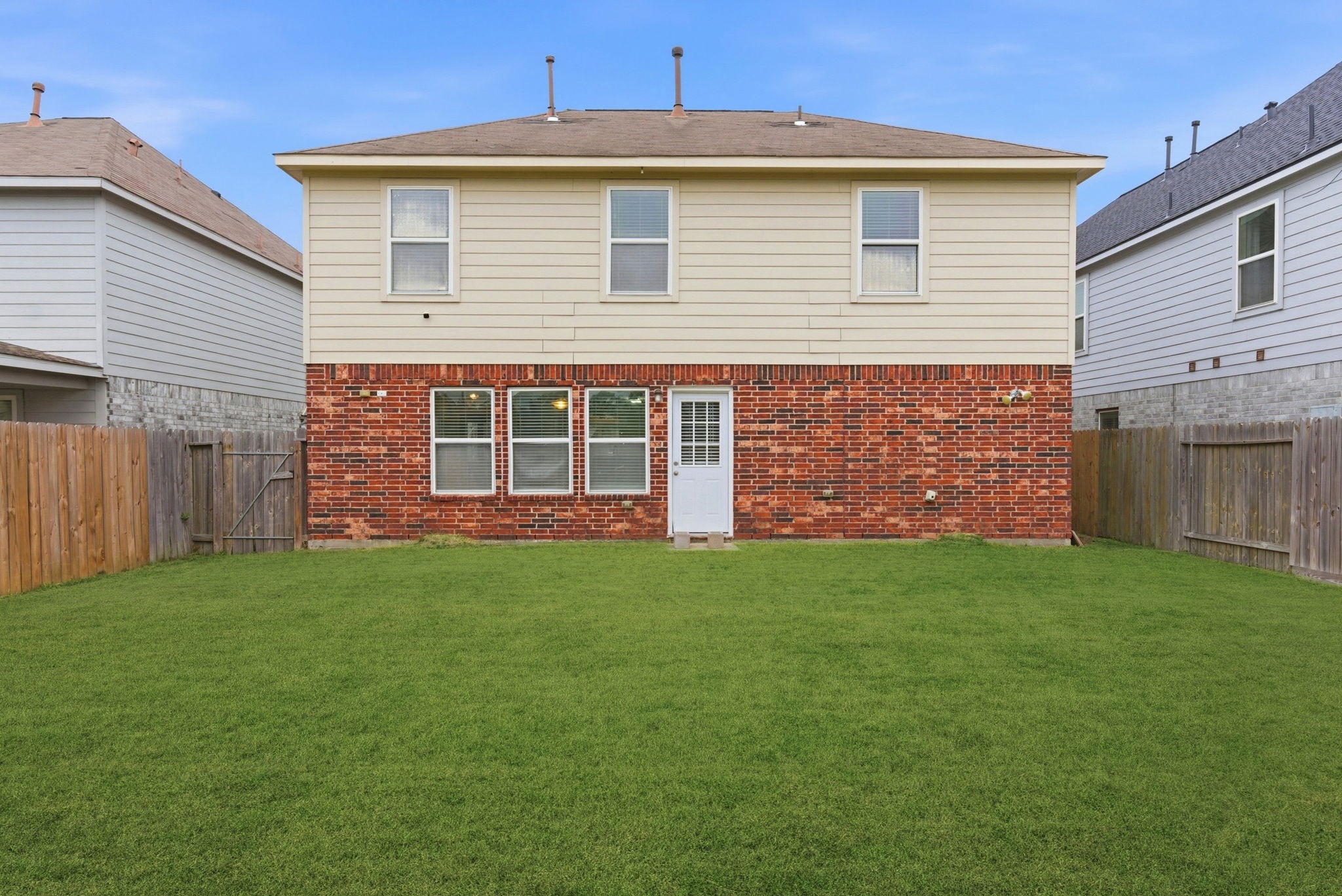 4910 Conifer Ridge Way Humble, TX 77346 - Photo 45 of 48 a front view of a house with a garden