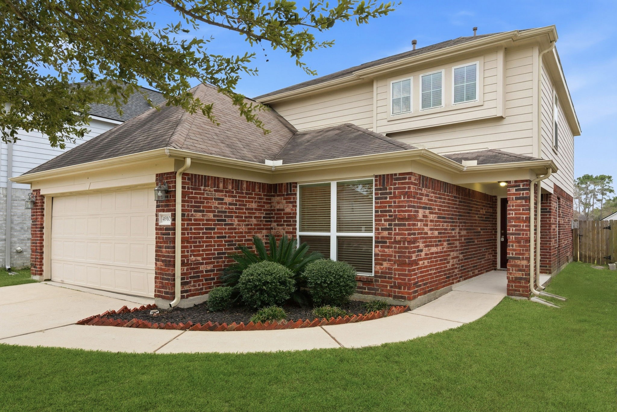 4910 Conifer Ridge Way Humble, TX 77346 - Photo 5 of 48 a view of a house with a yard