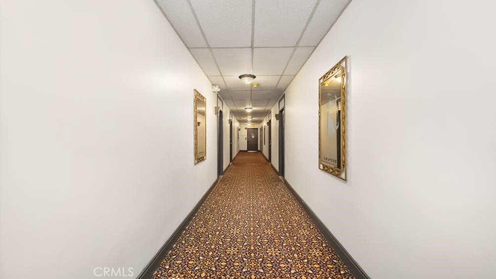 140 Linden Avenue, Unit 962 Long Beach, CA 90802 - Photo 21 of 21 a view of a hallway with a white walls