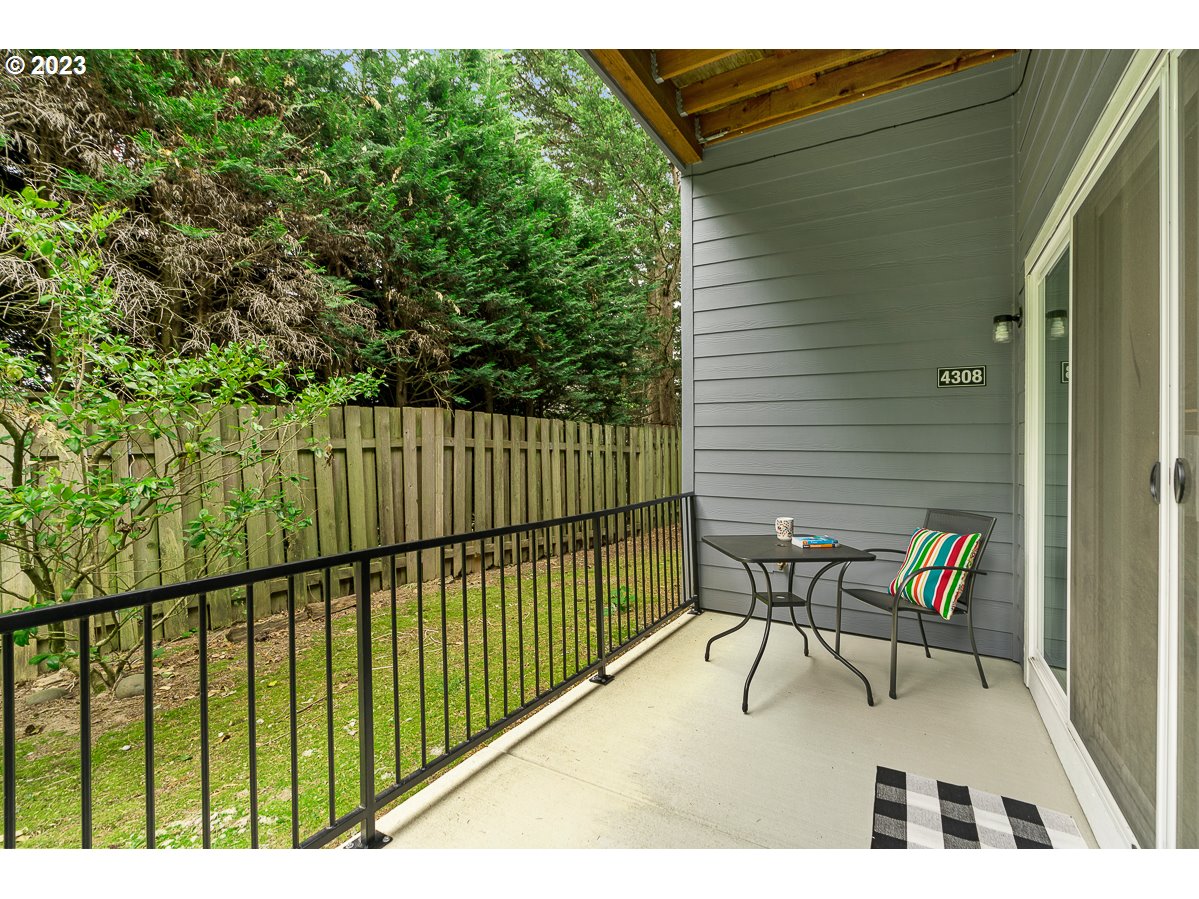 4308 Southwest Dickinson Street, Unit 15 Portland, OR 97219 - Photo 23 of 35 a view of balcony with furniture
