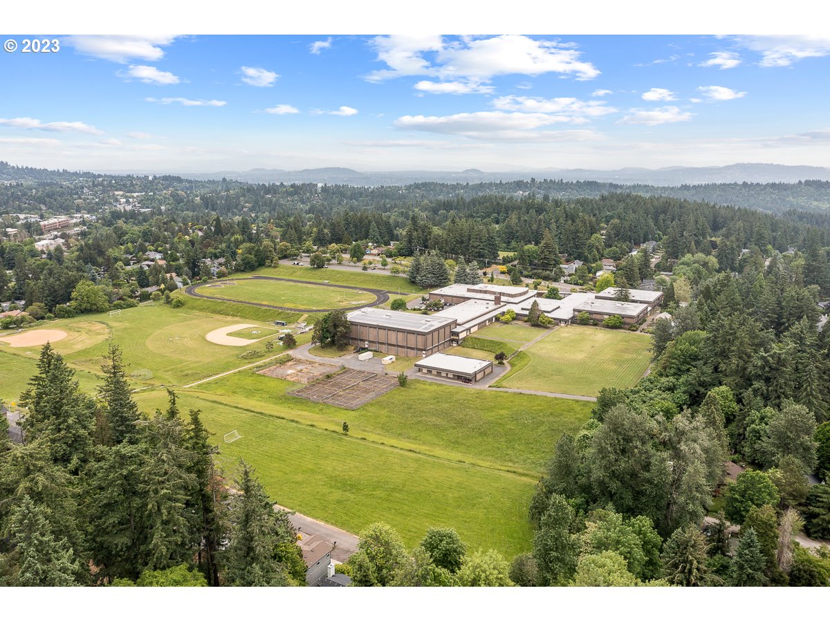 4308 Southwest Dickinson Street, Unit 15 Portland, OR 97219 - Photo 33 of 35 a view of a lake with a city