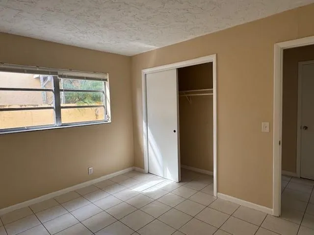 an empty room & windows