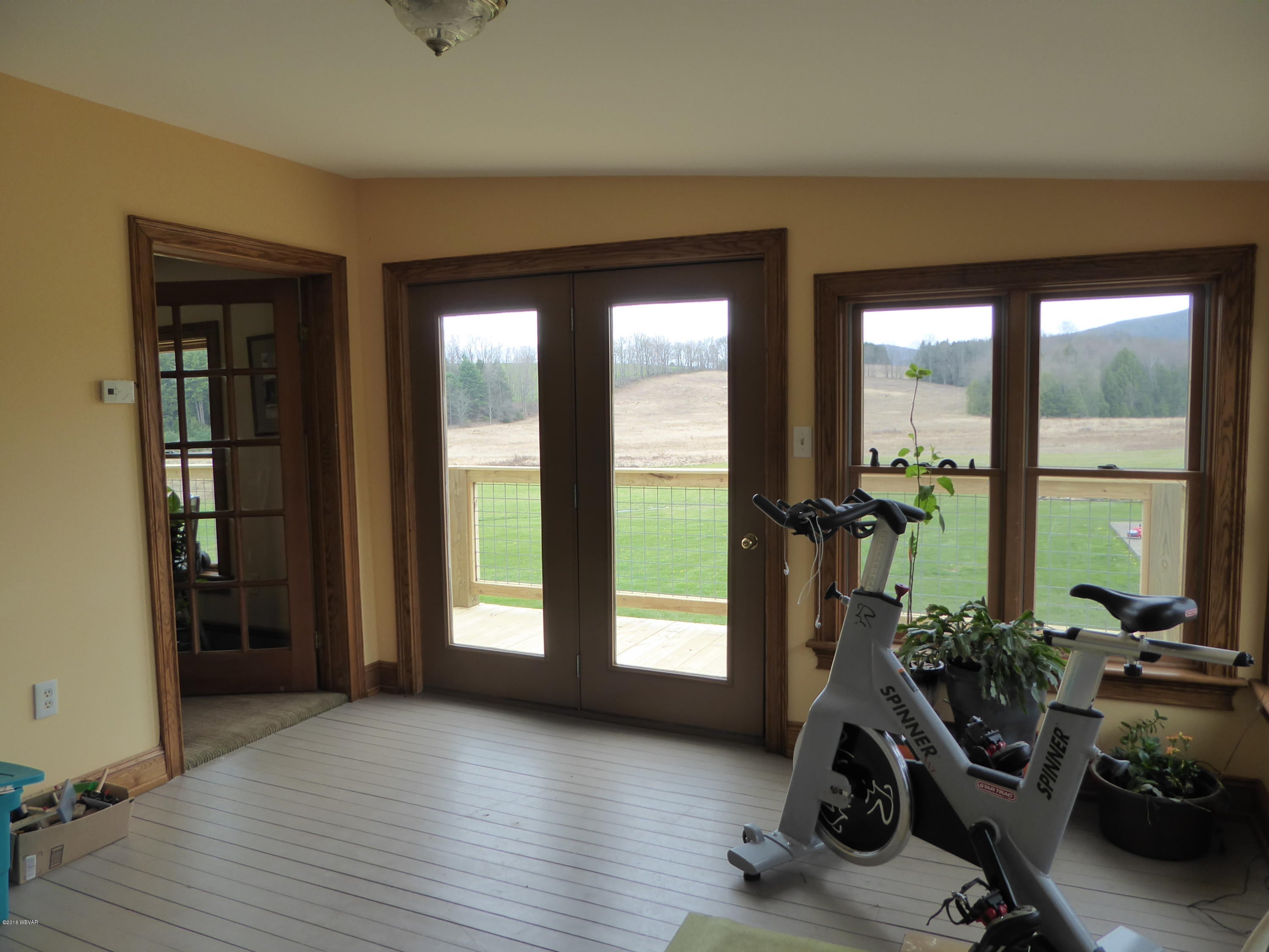 2351 Calvert Road Trout Run, PA 17771 - Photo 33 of 112 Sunroom with deck access-2351 Calvert Rd