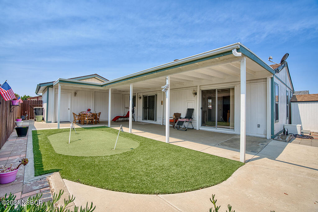 919 Vista Del Rio Santa Maria, CA 93458 - Photo 14 of 29 a view of a house with swimming pool and porch