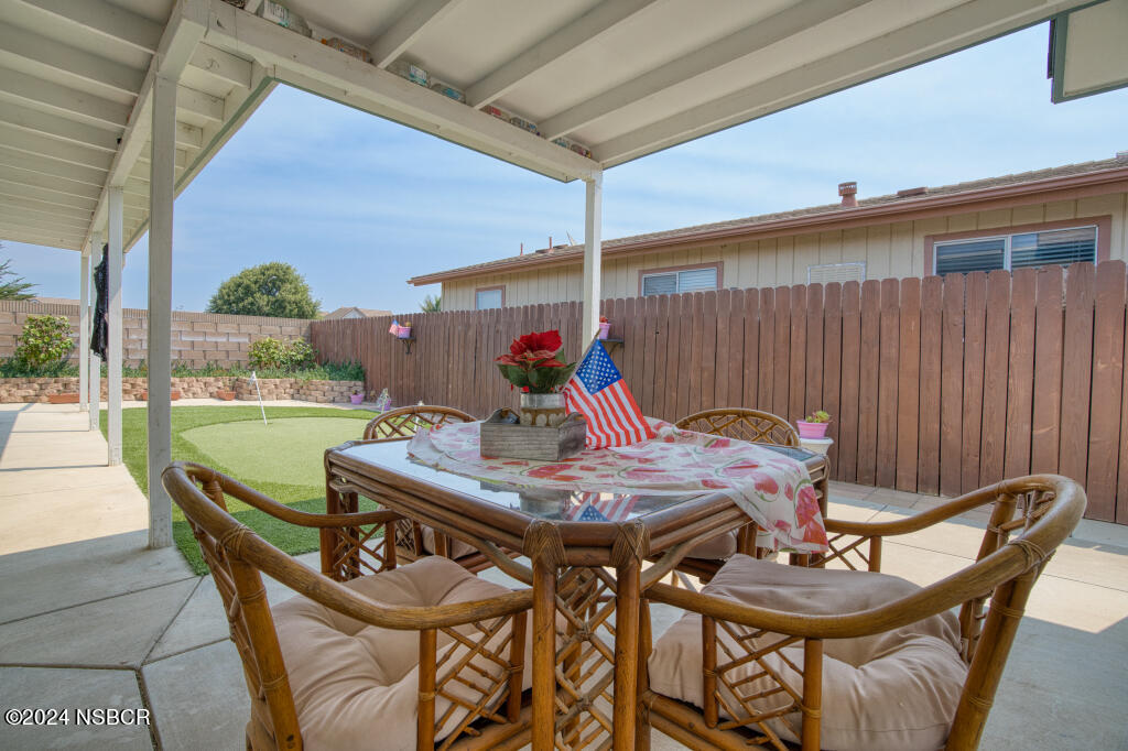 919 Vista Del Rio Santa Maria, CA 93458 - Photo 15 of 29 a view of an outside dining space with furniture