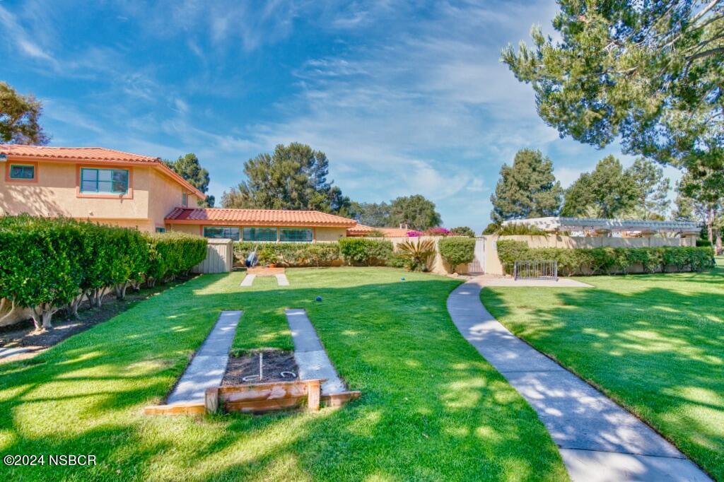 919 Vista Del Rio Santa Maria, CA 93458 - Photo 23 of 29 a view of yard with swimming pool and green space
