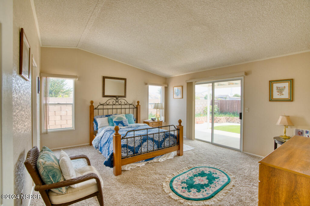 919 Vista Del Rio Santa Maria, CA 93458 - Photo 6 of 29 a bedroom with furniture and a large window
