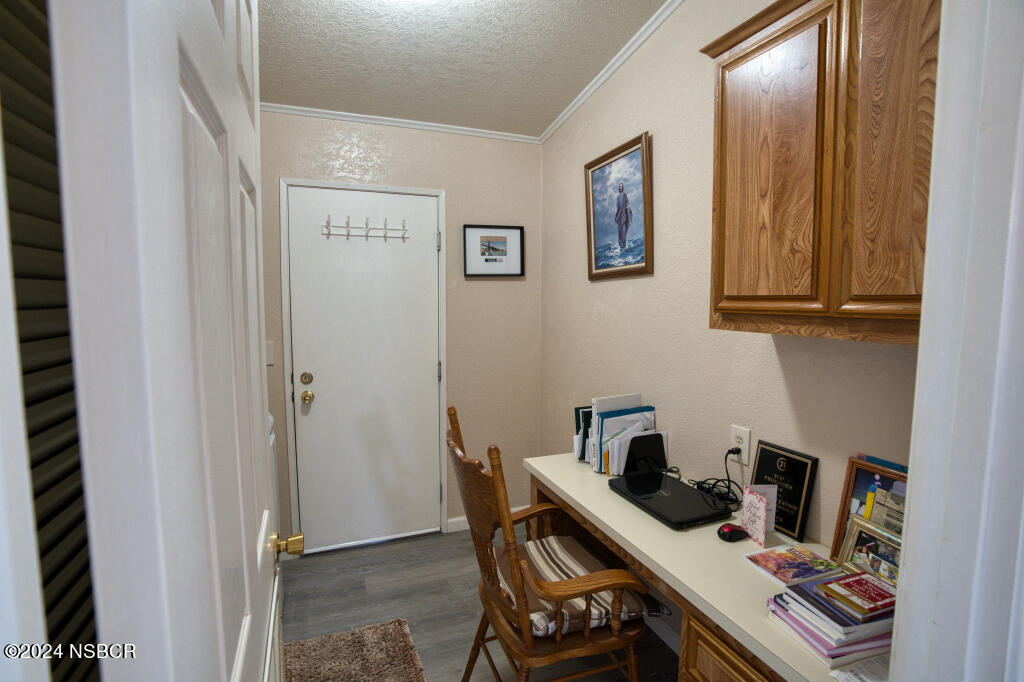 919 Vista Del Rio Santa Maria, CA 93458 - Photo 10 of 29 a view of a workspace with furniture and wooden floor