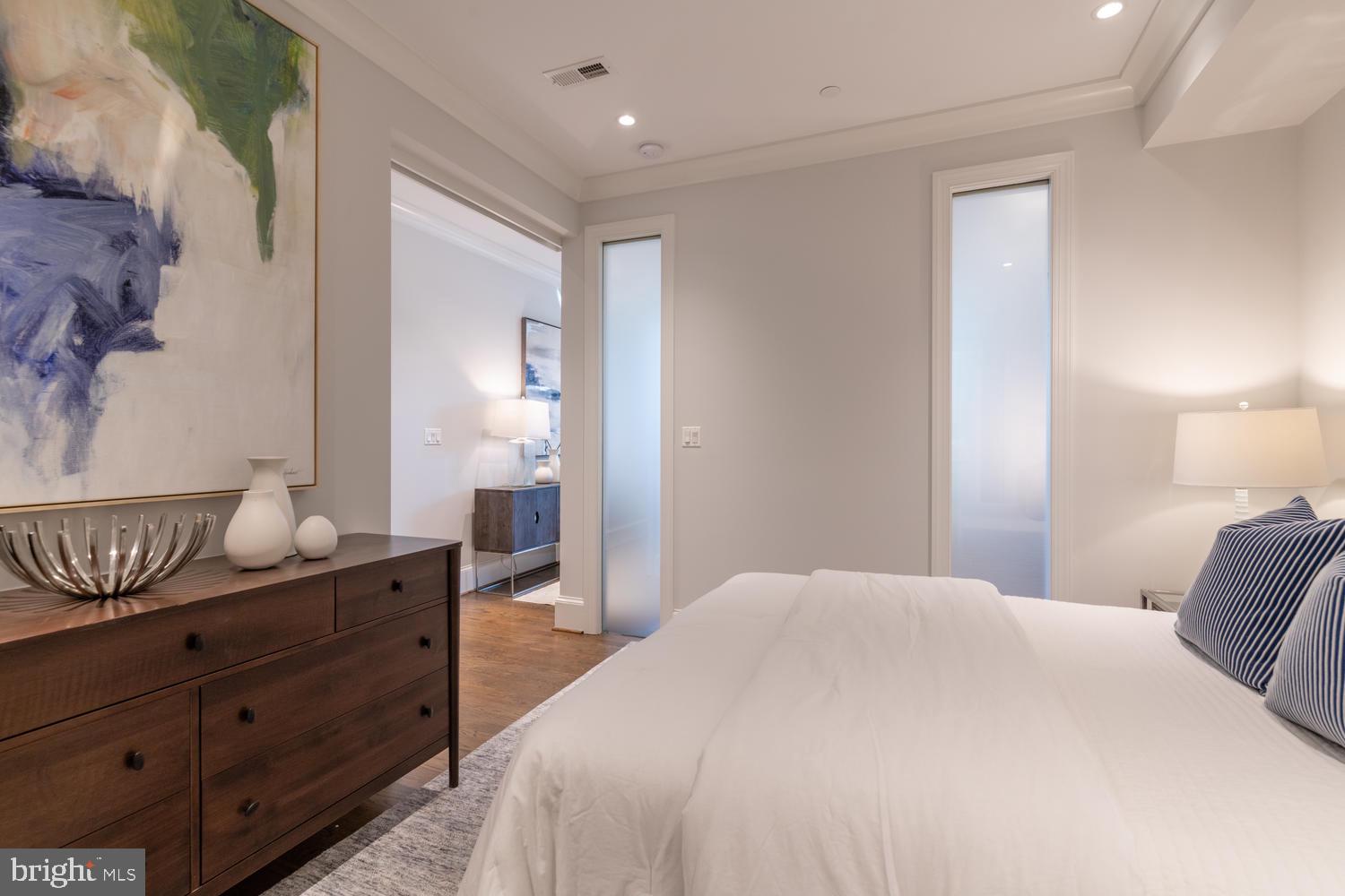 418 7th Street Southeast, Unit B102 Washington, DC 20003 - Photo 13 of 15 Light filled bedroom