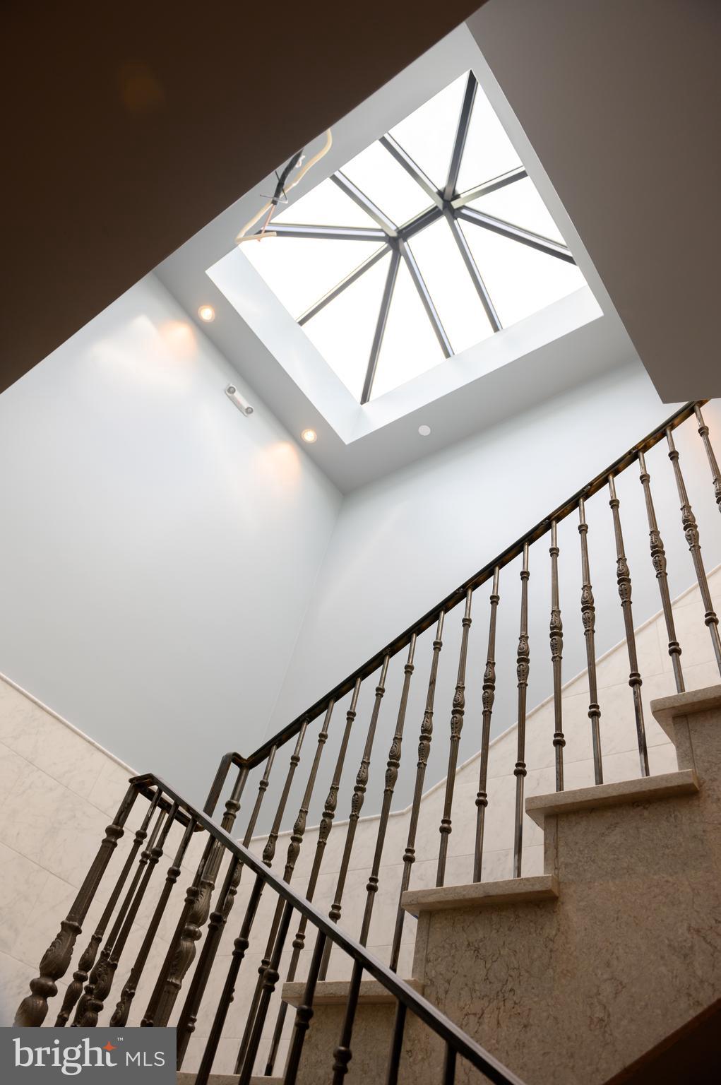 418 7th Street Southeast, Unit B102 Washington, DC 20003 - Photo 4 of 15 Light filled common corridor