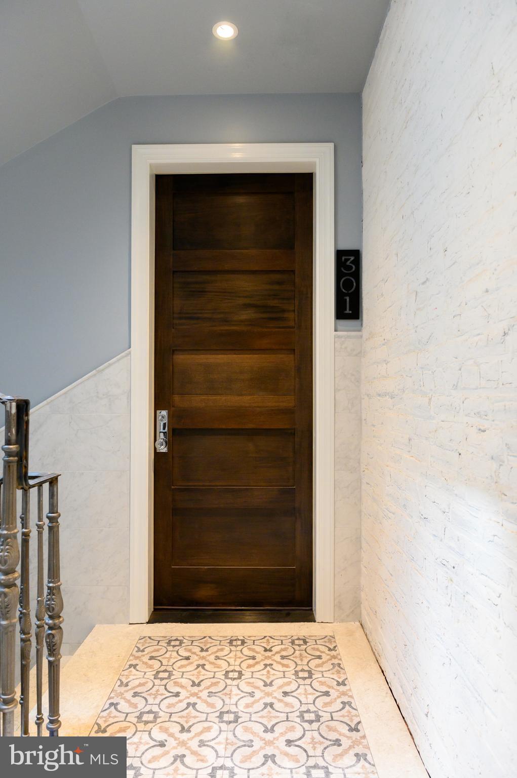418 7th Street Southeast, Unit B102 Washington, DC 20003 - Photo 7 of 15 Custom stained entry doors