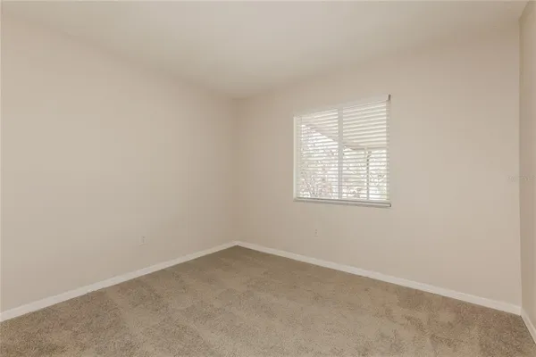 a bathroom with a sink toilet and a mirror