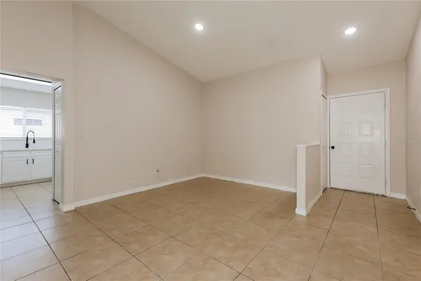 an empty room with a bathroom