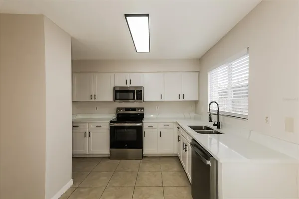 a view of an empty room with window