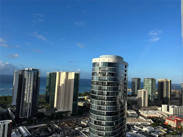 a view of a building with glass windows