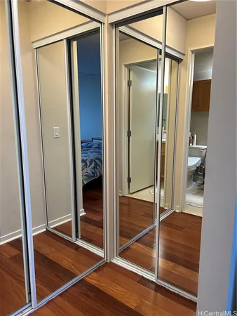a bathroom with a glass shower door