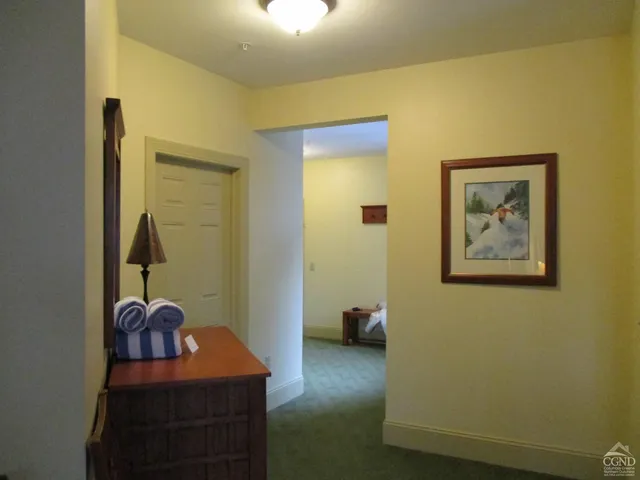 a view of a hallway with workspace