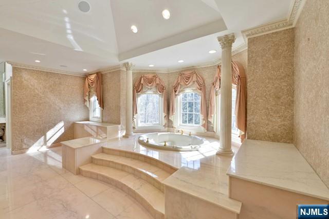 101 Fox Hedge Road Saddle River, NJ 07458 - Photo 14 of 21 a large living room with large windows