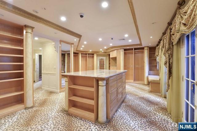 101 Fox Hedge Road Saddle River, NJ 07458 - Photo 16 of 21 a spacious bathroom with a tub and shower