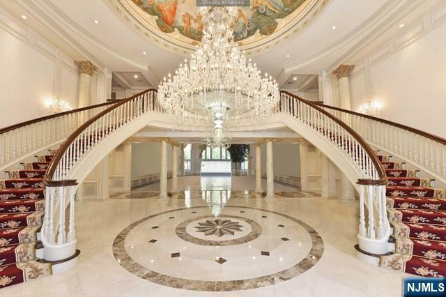 101 Fox Hedge Road Saddle River, NJ 07458 - Photo 4 of 21 a view of a living room and staircase