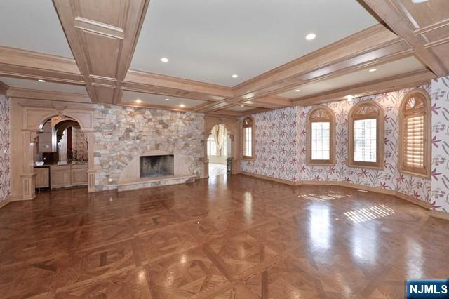 101 Fox Hedge Road Saddle River, NJ 07458 - Photo 10 of 21 a view of empty room with wooden floor and fan