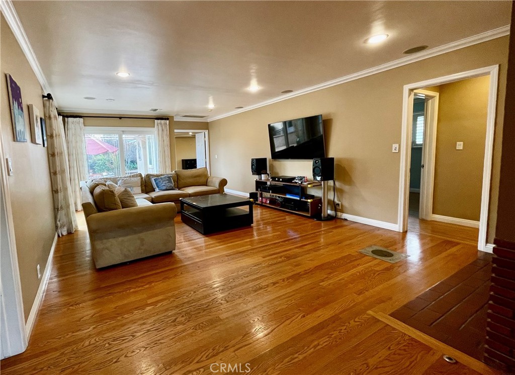 1142 Paloma Drive Arcadia, CA 91007 - Photo 13 of 42 a living room with furniture and a flat screen tv