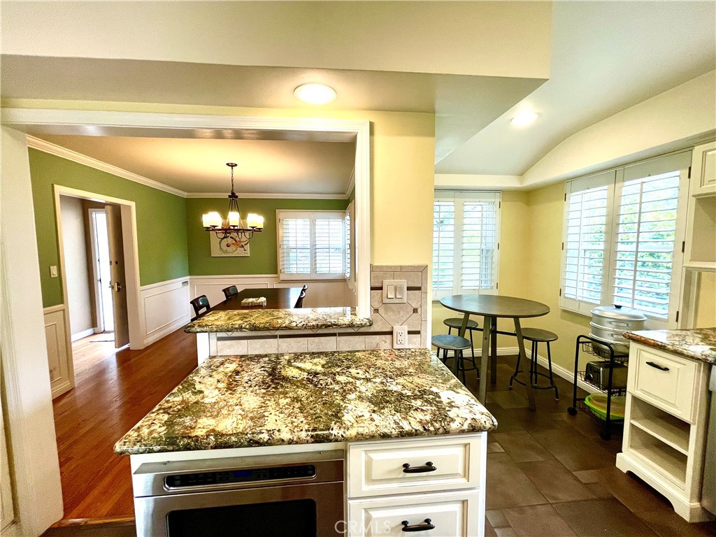 1142 Paloma Drive Arcadia, CA 91007 - Photo 16 of 42 a large kitchen with a table and chairs