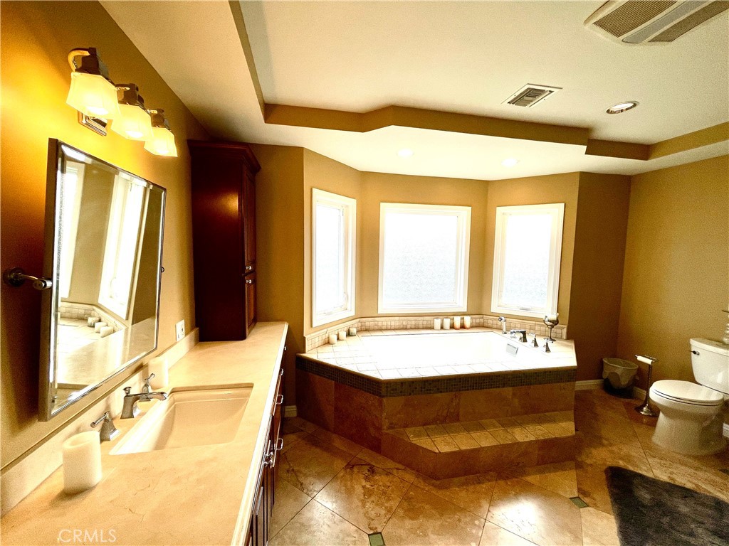 1142 Paloma Drive Arcadia, CA 91007 - Photo 27 of 42 a bathroom with a tub sink and mirror