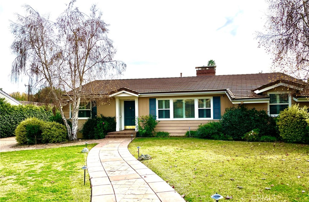 1142 Paloma Drive Arcadia, CA 91007 - Photo 3 of 42 a front view of a house with garden