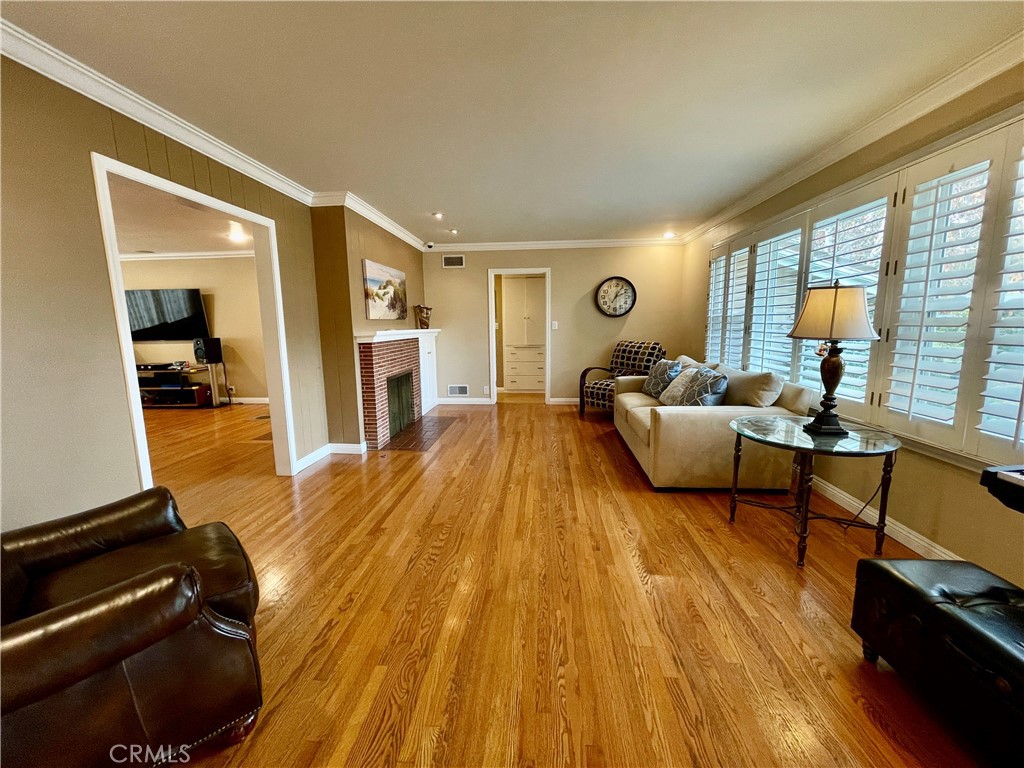 1142 Paloma Drive Arcadia, CA 91007 - Photo 10 of 42 a spacious bedroom with a bed and wooden floor