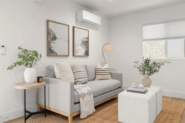 a bathroom with a sink mirror and toilet