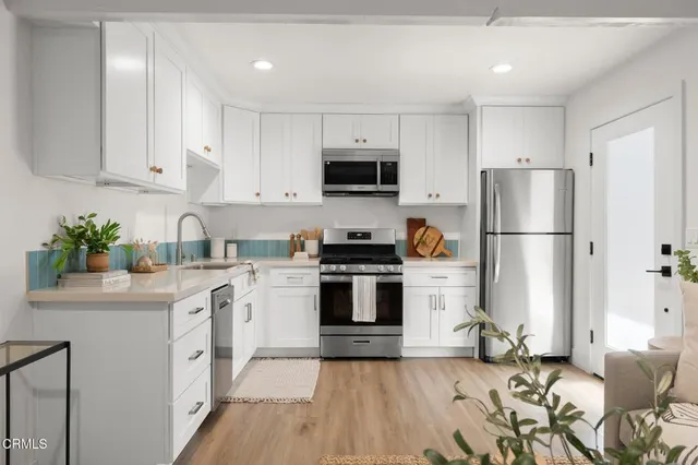 an aerial view of a city with lots of residential buildings