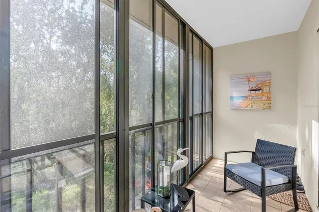 a view of a hallway with seating area