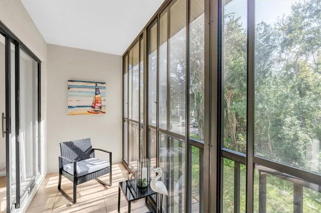 a view of an entryway with a lot of plants